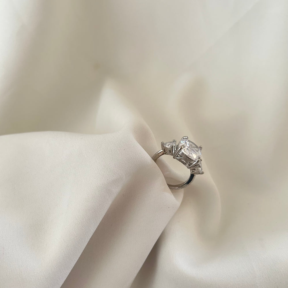 Cushion Solitaire Three-Stone Ring
