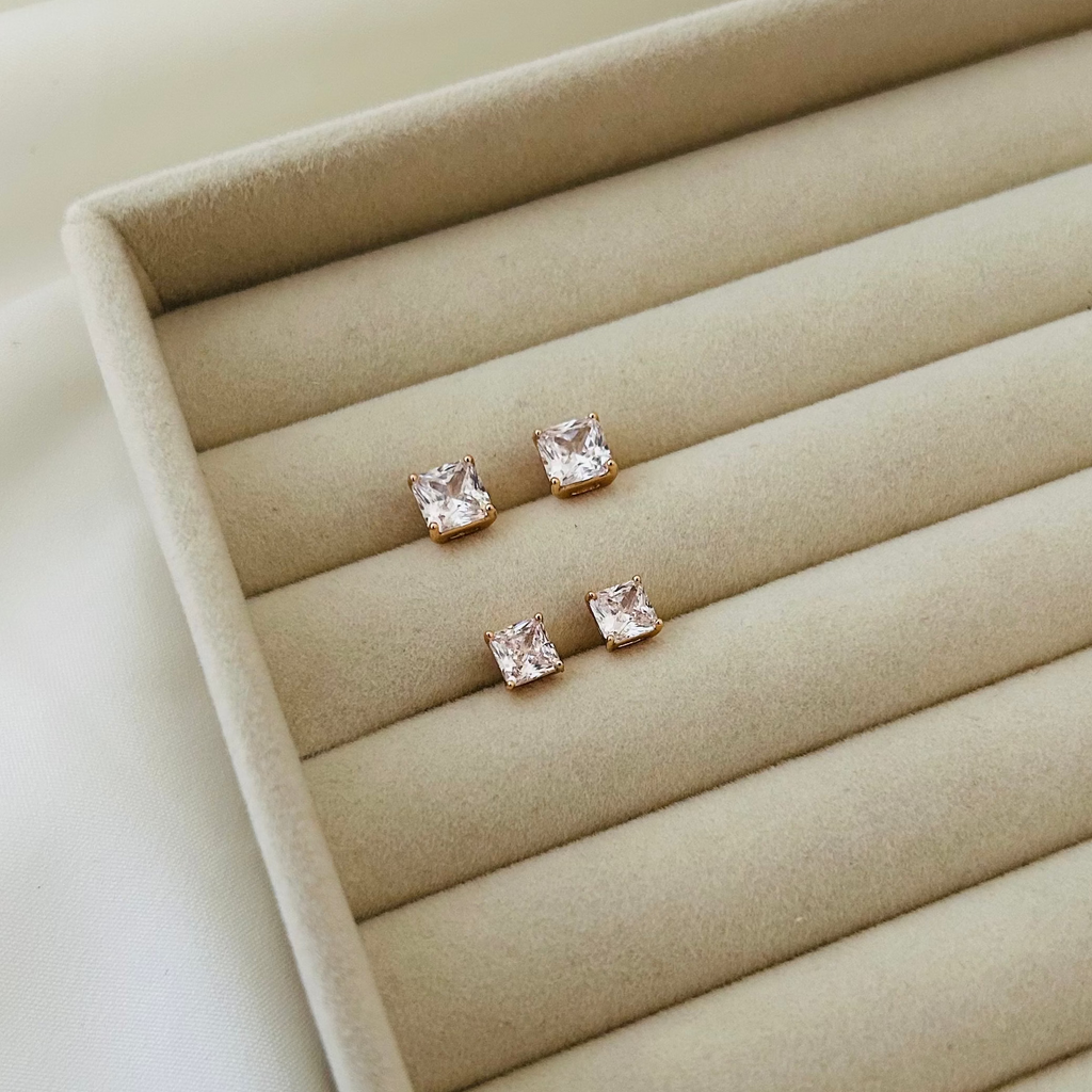 square crystal stud earrings in gold finish, ideal for minimal and chic styling.
