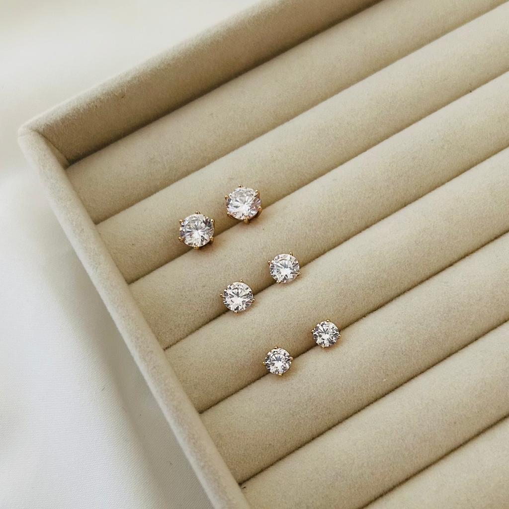 Minimal gold round crystal stud earrings in different size, perfect for everyday elegance