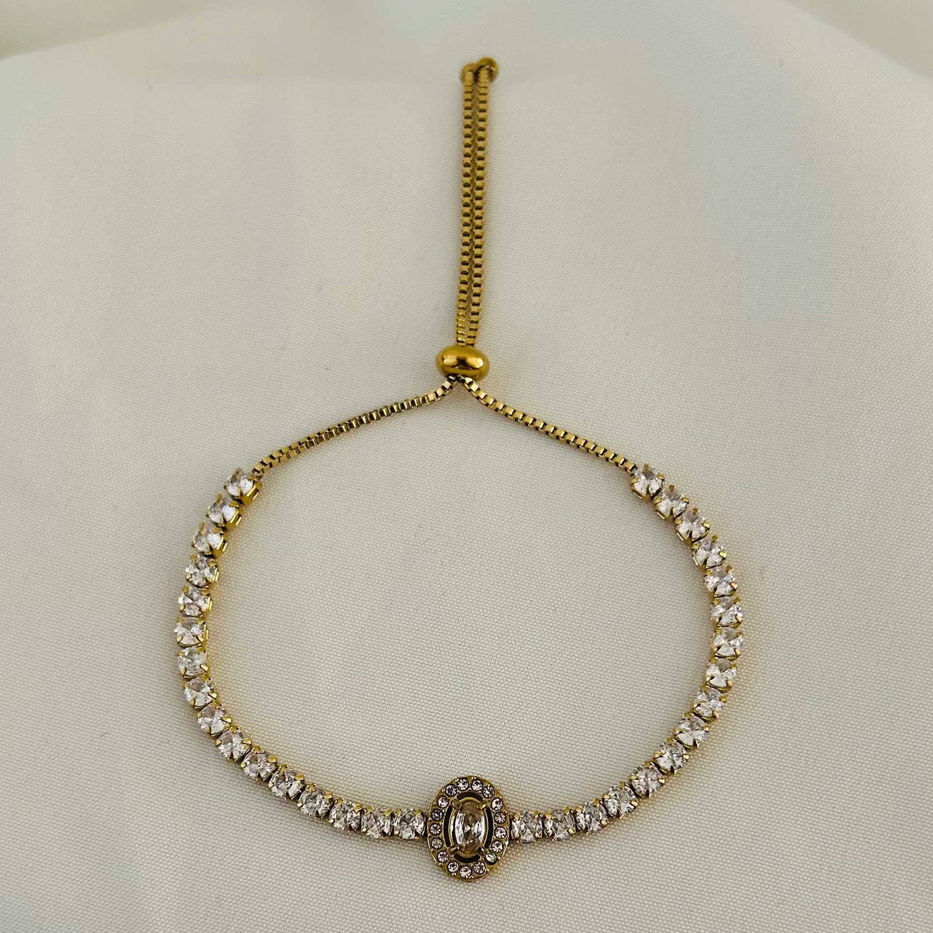 Gold adjustable bracelet with crystal stones